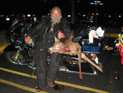 Dave Zien with Deer he hit with motorcycle while riding at night