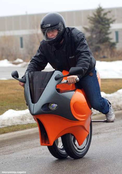 Man riding motorized unicycle